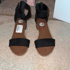 Black Sandals will small heel. Never worn